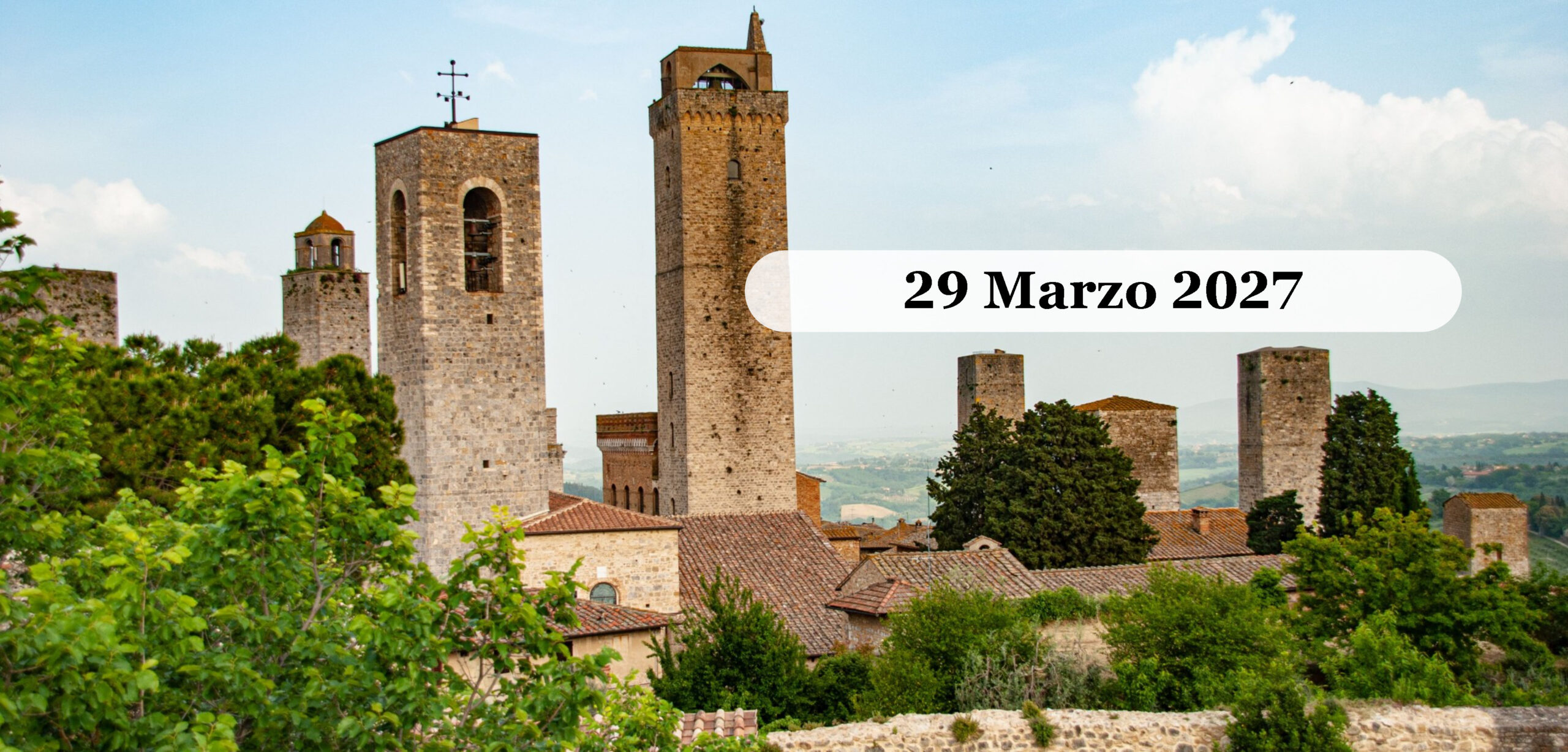 Pasquetta a San Gimignano: Monteriggioni, Abbadia Isola e la Gerusalemme di Toscana Marzo 2027 Le torri medievali di San Gimignano che svettano sopra i tetti del borgo, con le colline della Valdelsa sullo sfondo